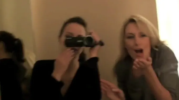 Blonde sexy babe is in the changing room trying on sexy bras