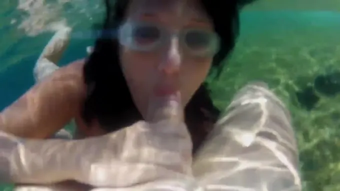 Hot chick gives him an underwater blowjob and gets fucked hard