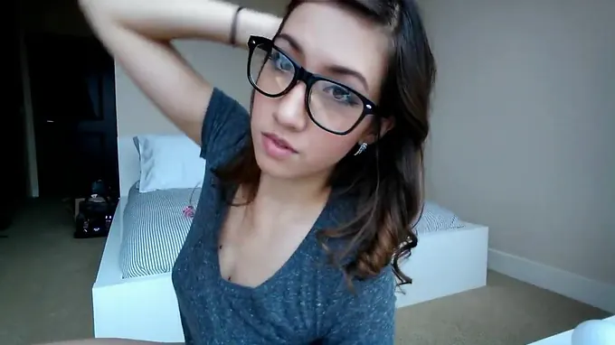 Smoking hot teen brunette is fucking herself with a slutty dildo