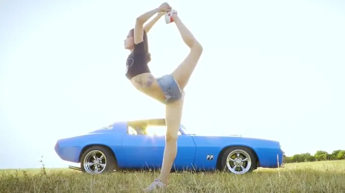 Cute babe is posing totally naked next to her boyfriend's blue car