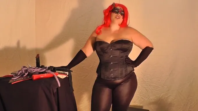 Nasty whore wearing latex costume and ready to abuse her slave rough