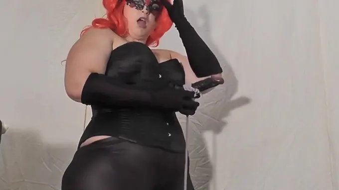 Nasty whore wearing latex costume and ready to abuse her slave rough
