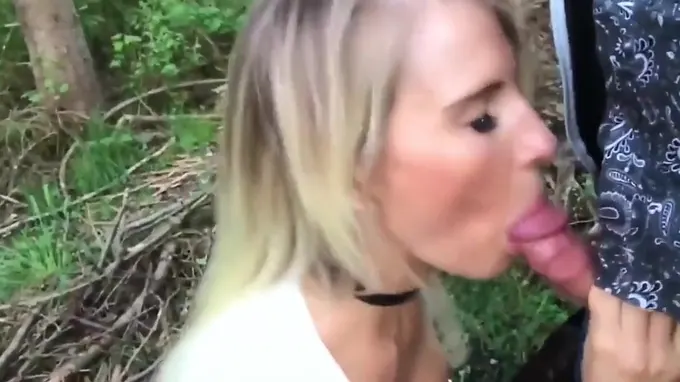 Gorgeous teen gives a blowjob outdoors and gets boobs cum covered