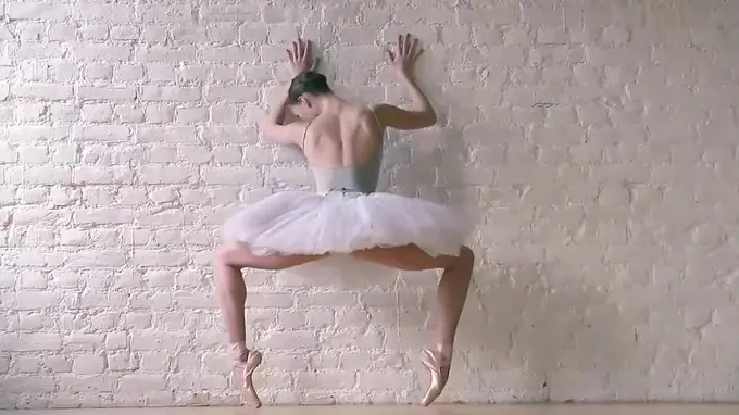 Horny ballerina dancing seductively and takes off her clothes