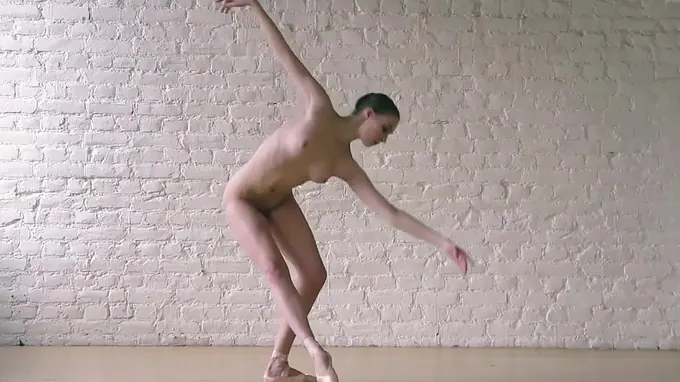 Horny ballerina dancing seductively and takes off her clothes