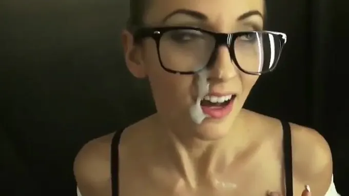 Gorgeous geeky babe gets fucked and facialized in the elevator