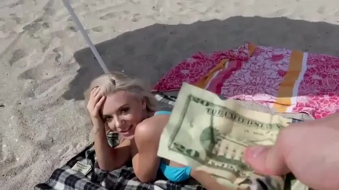 Spectacular blonde babe is blowing a huge erect dick on the beach