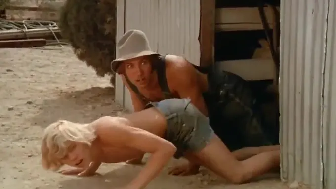 Two cowboys are spying on this naked babe taking shower outdoors