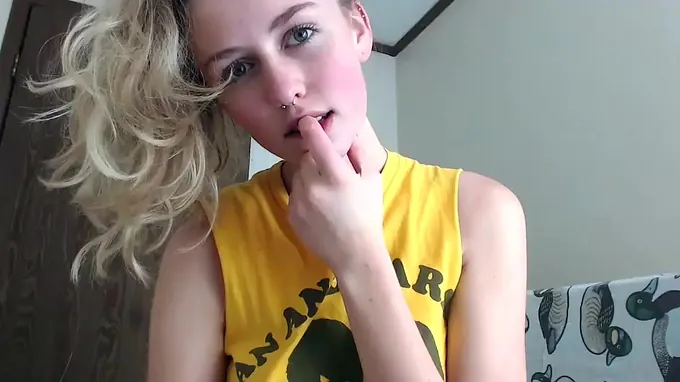 Teen whore spreads out her legs and is fingering her pussy hole