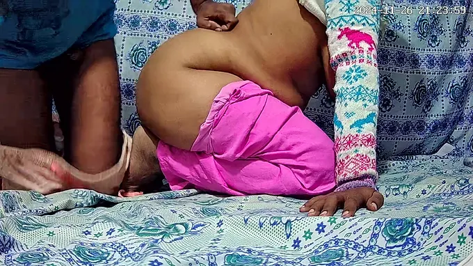 Watch this Indian couple's wild doggy-style orgy with big tits and ass action!