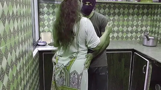 Rukhsana1 and Bhabhi get their Indian Desi Kitchen party on with a steamy massage and ass-clapping session