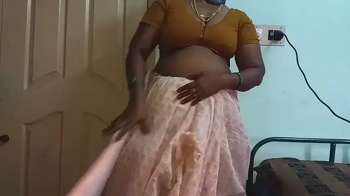 Hot MILF Mallu Aunty gets naked and finger-tickling for her dad-in-law in a hotel room