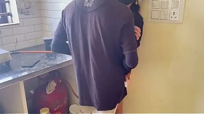 Watch Asrita, a young Indian bhabhi, get her creamy pussy pounded by her spouse in the kitchen