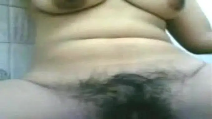 Watch this hot wife finger herself to orgasmic bliss