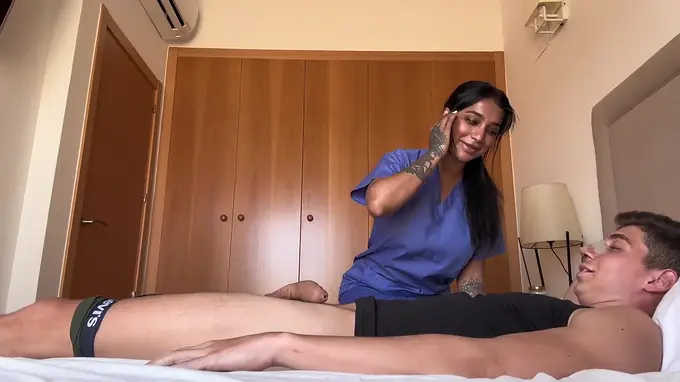 Yasmina and Brady take turns cumming on their strung up patient in the hospital